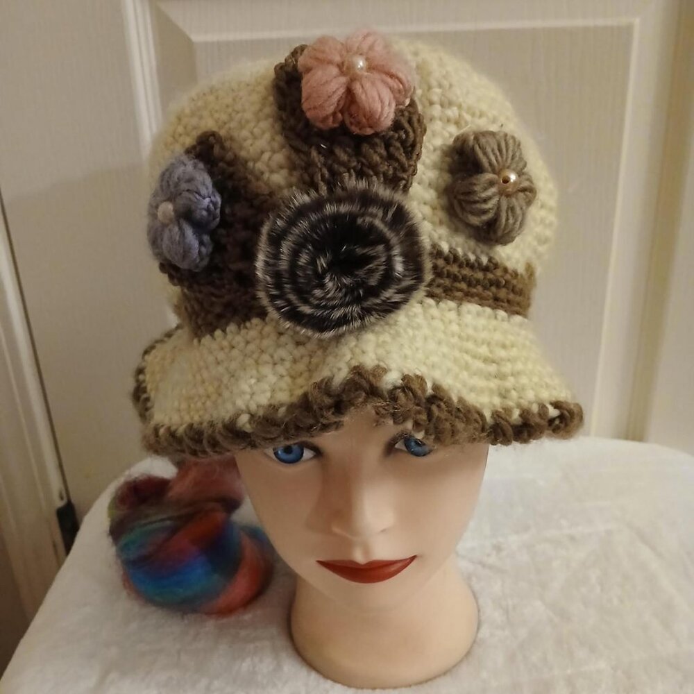 Vintage handmade cream and brown crochet bucket hat with faux fur floral accents